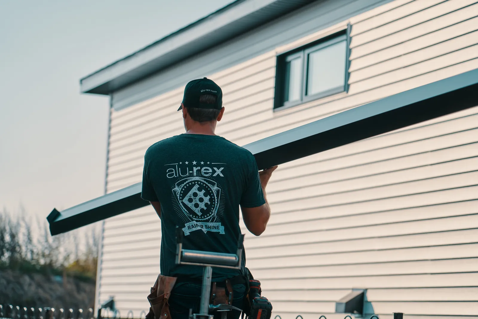 Seamless gutter installation from the ladder — Berrys Eavestrough, south-central Ontario BC
