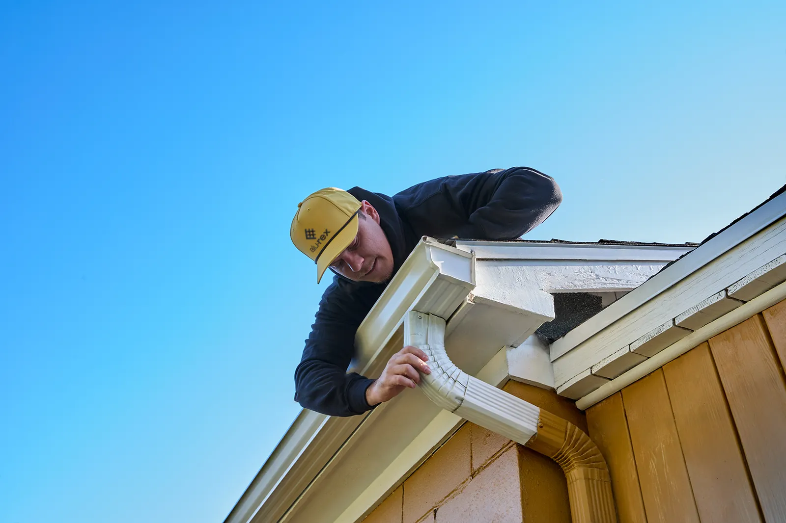 Downspout preparation and fitting — Berrys Eavestrough, south-central Ontario BC